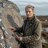 Portrait of Dr. Astrid Lindqvist outdoors beside a granite boulder