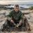 Portrait of Søren Halvorsen at a coastal excavation trench